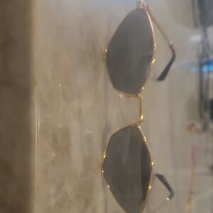 Miu Miu Gold Sunglasses with Dark Lenses